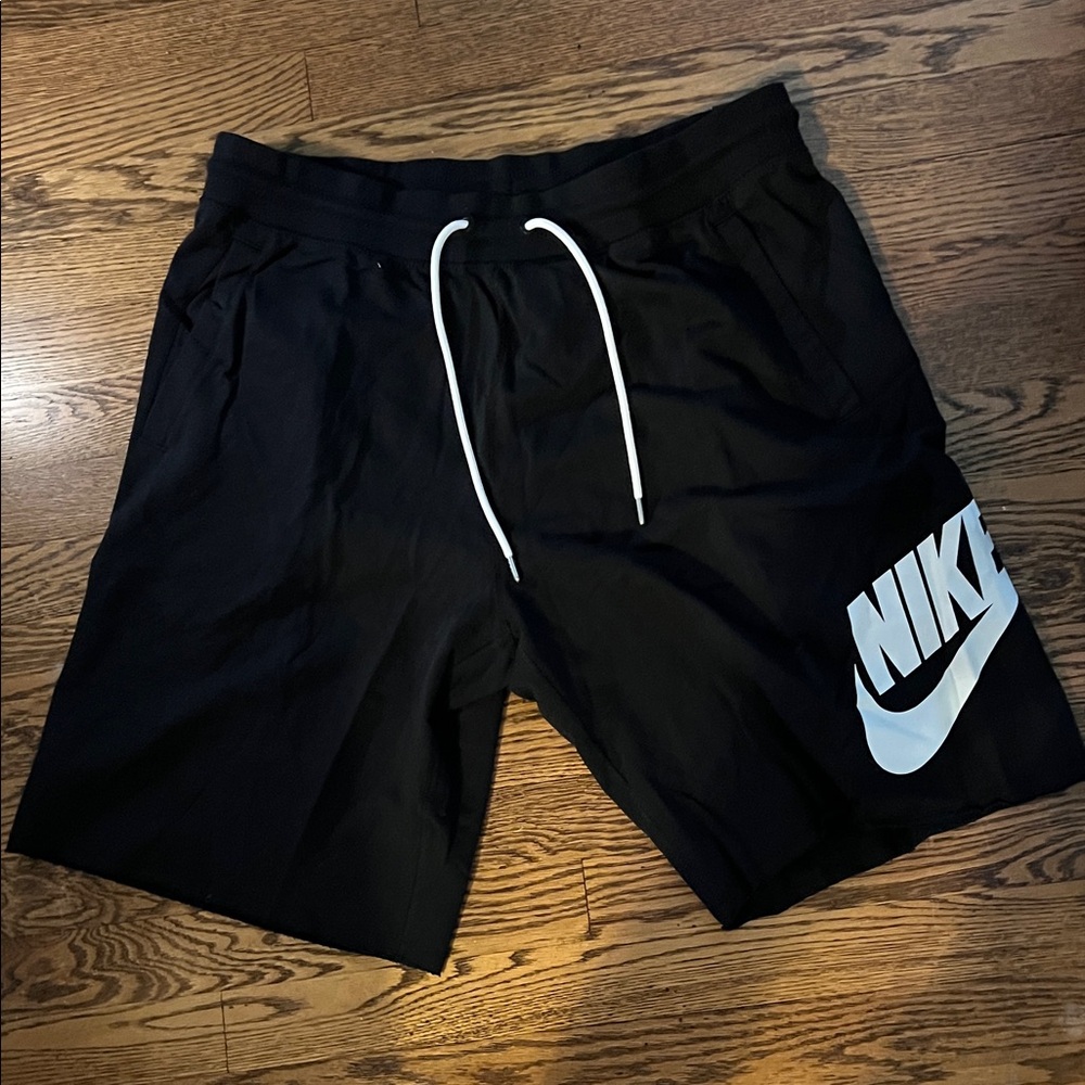 Nike Men's Black Athletic Shorts with White Logo